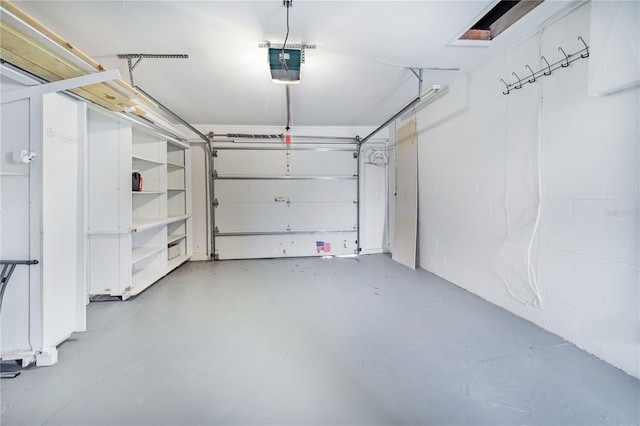 garage featuring a garage door opener