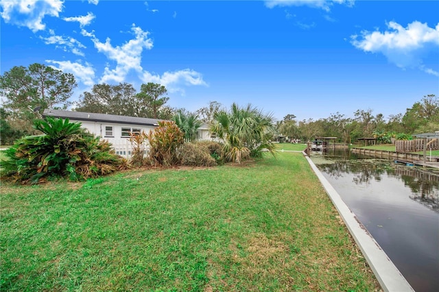 view of yard with a water view