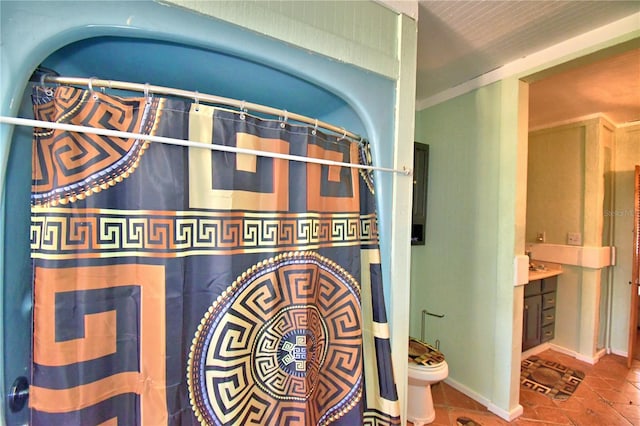 interior details featuring a shower with shower curtain, vanity, and toilet