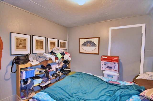 bedroom with a textured ceiling