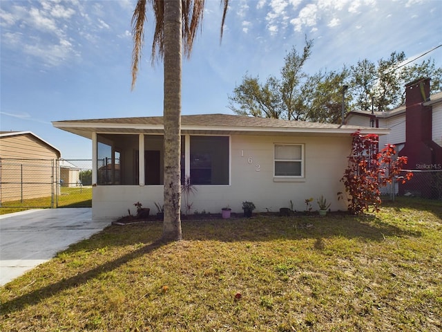 view of front of home with a front lawn