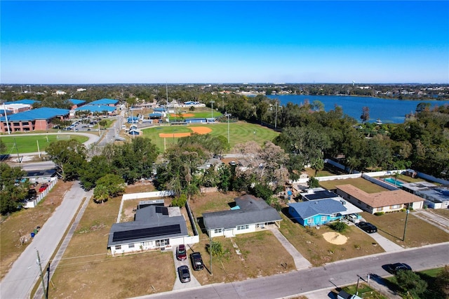 birds eye view of property featuring a water view