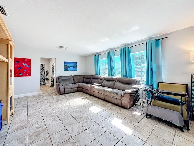 living room with a textured ceiling