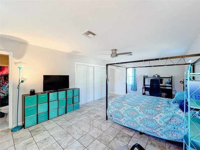 bedroom with ceiling fan and a closet