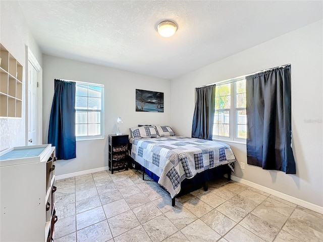 bedroom with a textured ceiling