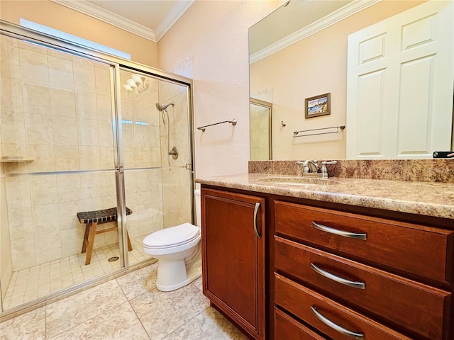 bathroom with crown molding, vanity, an enclosed shower, and toilet