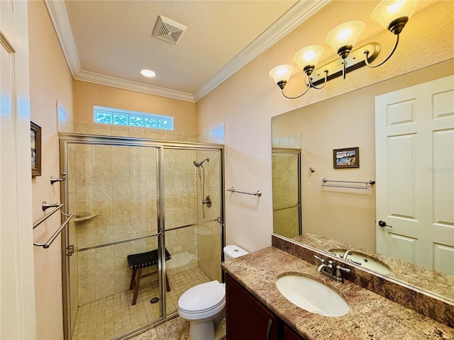 bathroom with ornamental molding, vanity, a shower with door, tile patterned flooring, and toilet