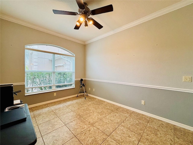 tiled spare room featuring ceiling fan and ornamental molding