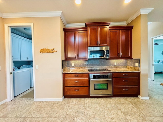 kitchen featuring light stone countertops, independent washer and dryer, stainless steel appliances, and tasteful backsplash