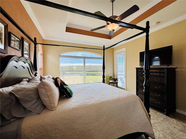 bedroom featuring ceiling fan and ornamental molding