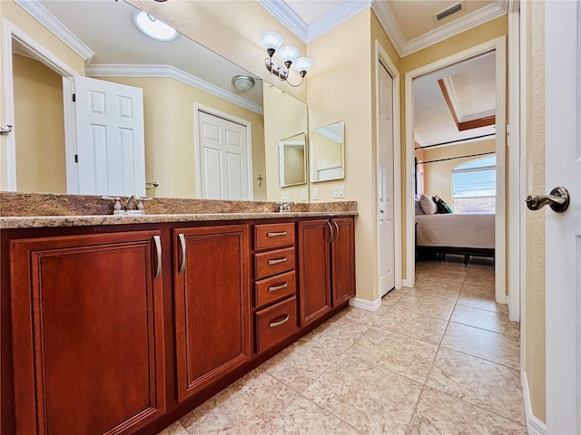 bathroom featuring vanity and ornamental molding