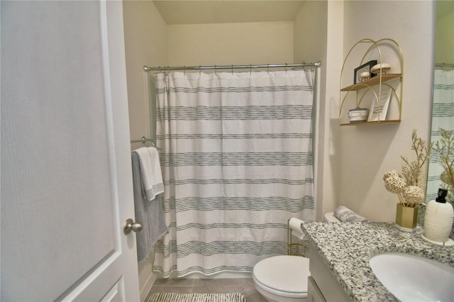 bathroom with tile patterned floors, vanity, toilet, and a shower with shower curtain