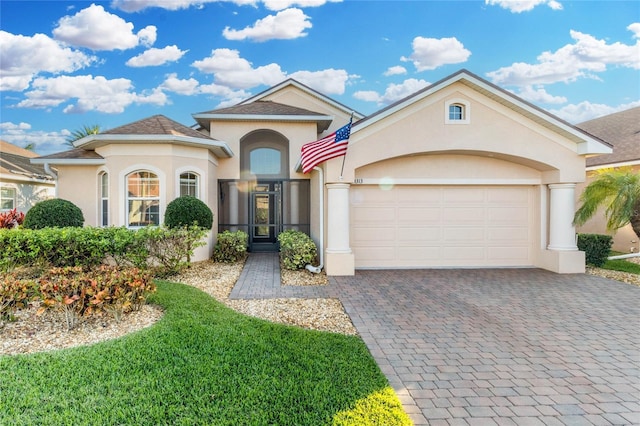 view of front of home with a garage