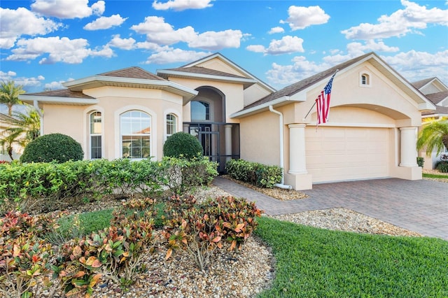 view of front of property featuring a garage