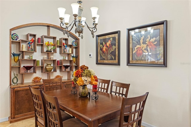 dining space featuring baseboards