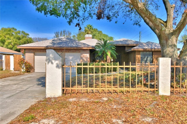 view of front of property featuring a garage