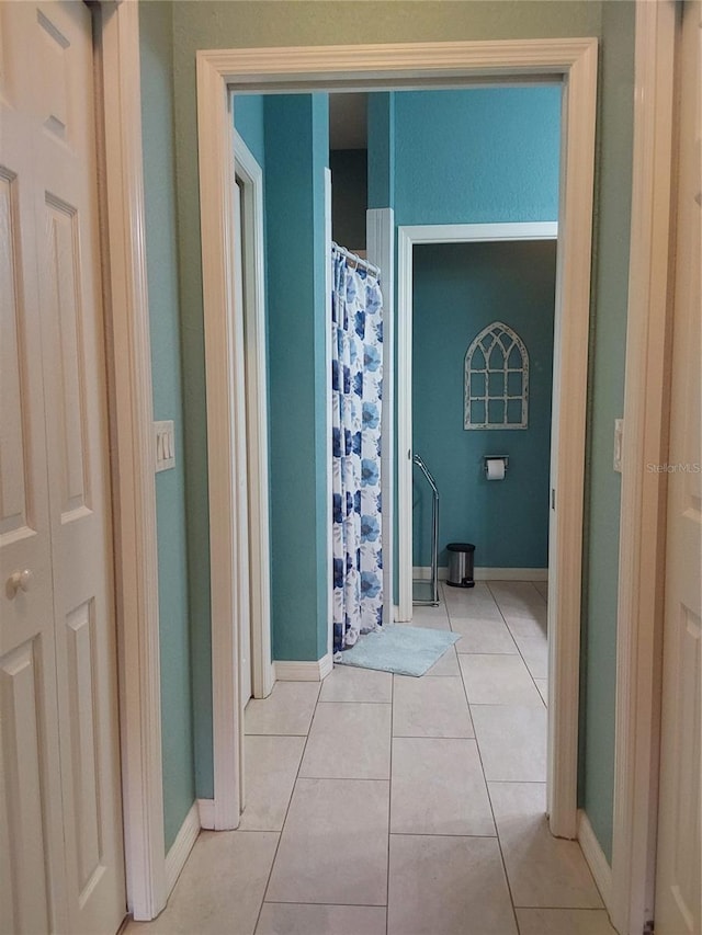 bathroom with tile patterned flooring