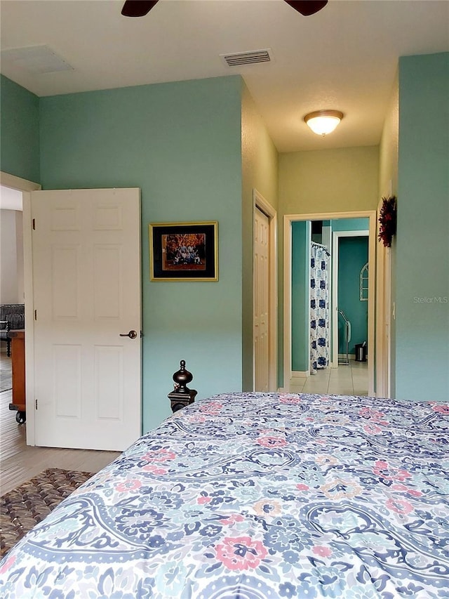 bedroom featuring hardwood / wood-style floors and ceiling fan