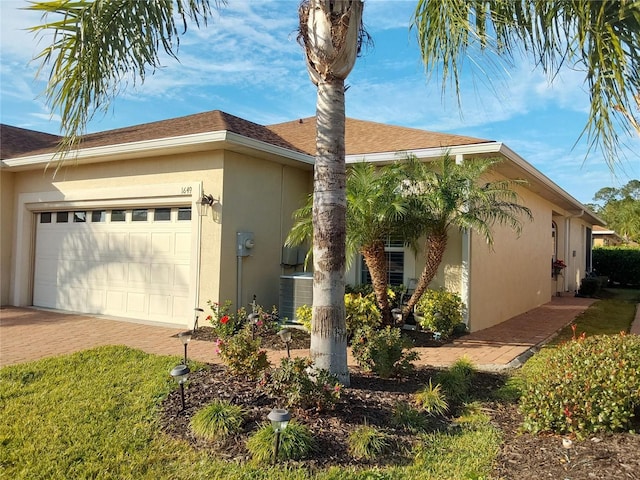 view of property exterior featuring a garage