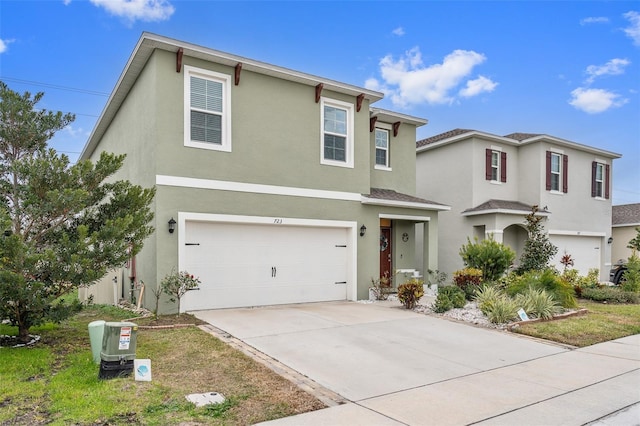 view of front of home with a garage