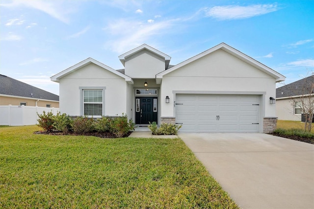 view of front of home featuring a garage and a front lawn