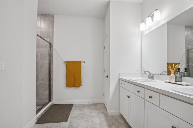 bathroom featuring walk in shower and vanity