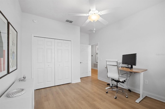 office area with ceiling fan and light hardwood / wood-style flooring