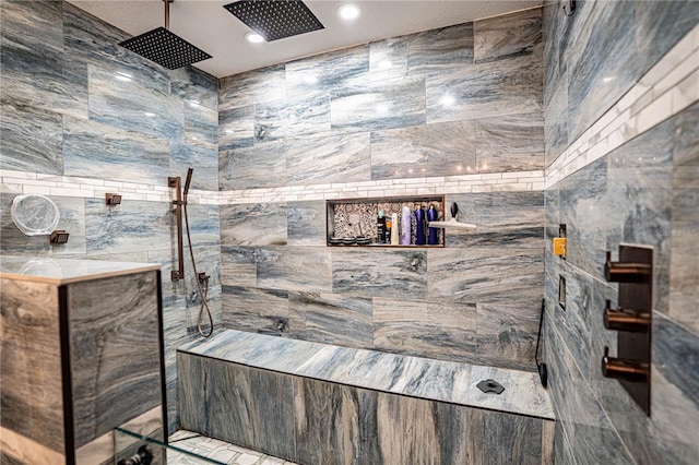 bathroom featuring tiled shower