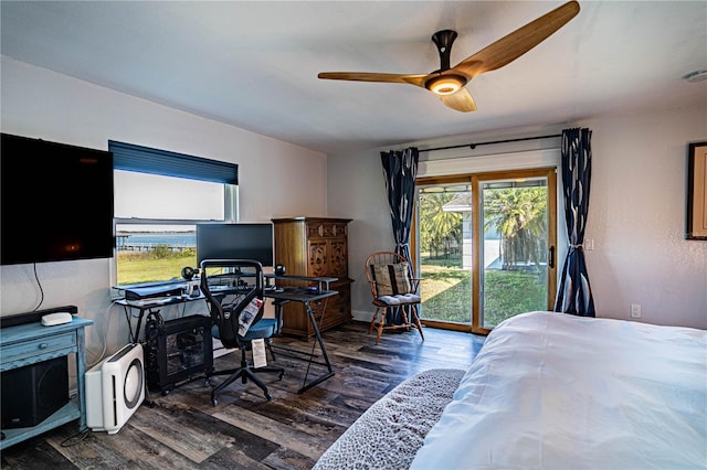 bedroom with ceiling fan, dark hardwood / wood-style flooring, and access to exterior