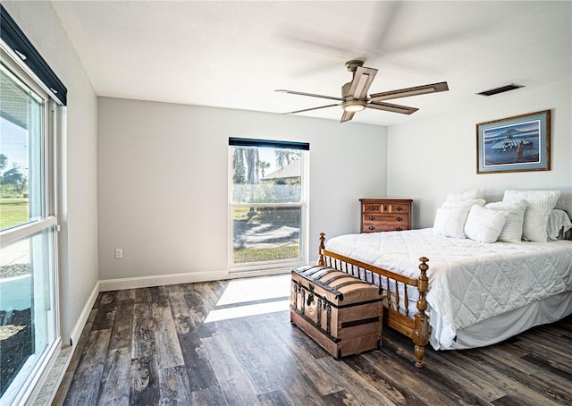 bedroom featuring ceiling fan and dark hardwood / wood-style floors