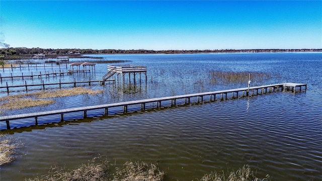 dock area featuring a water view