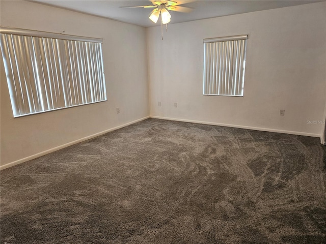 carpeted empty room with ceiling fan