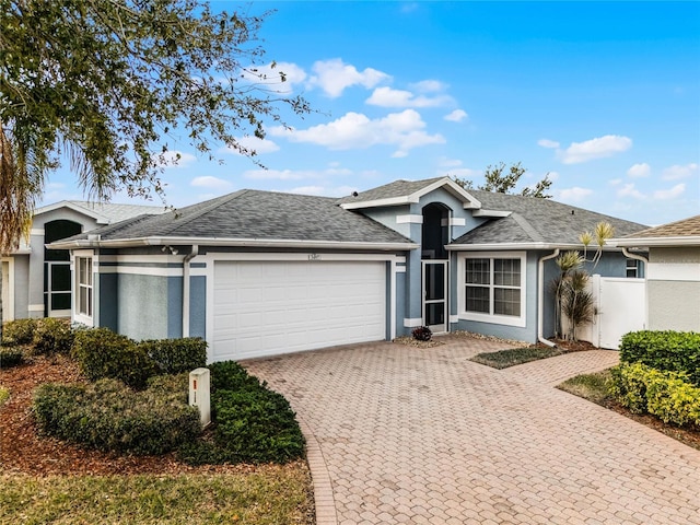 single story home featuring a garage