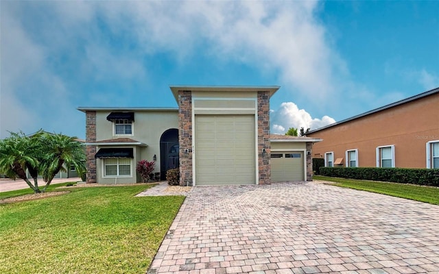 view of front facade featuring a front lawn and a garage