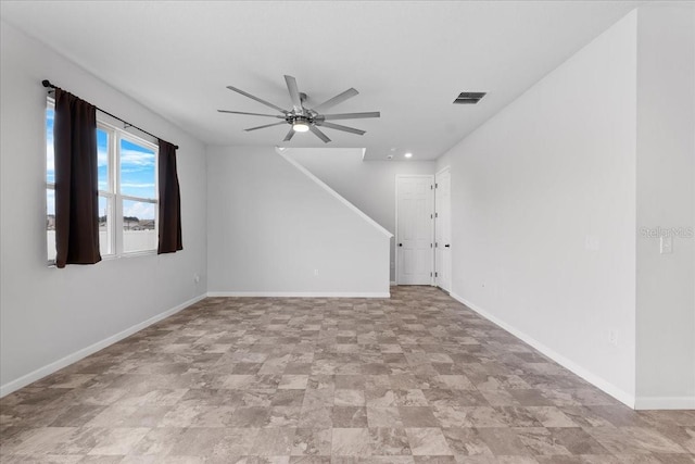 empty room featuring ceiling fan