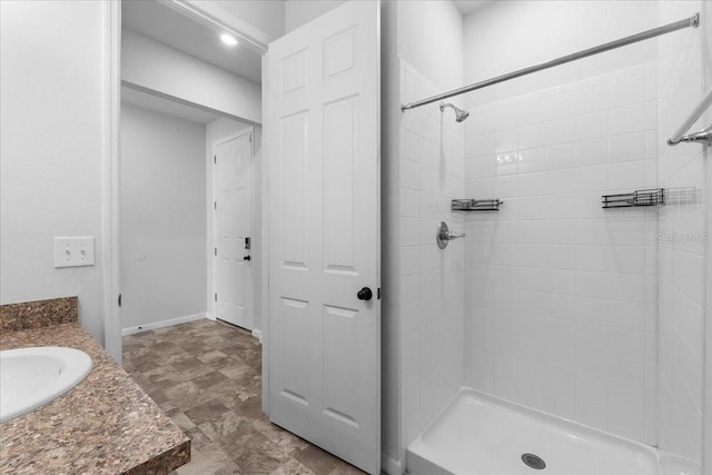 bathroom with vanity and walk in shower