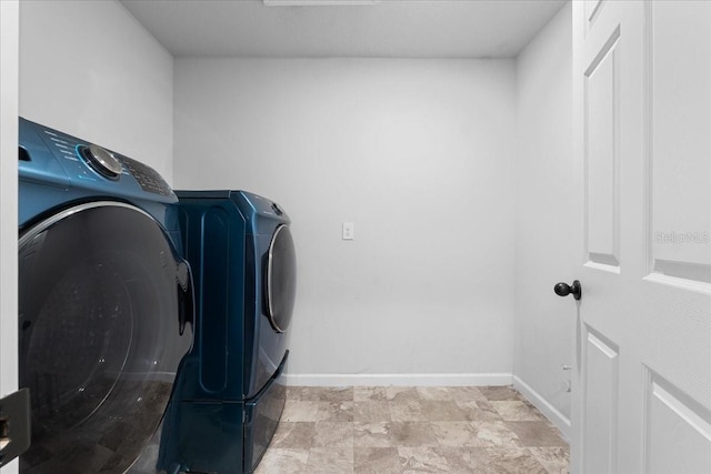 laundry area featuring independent washer and dryer