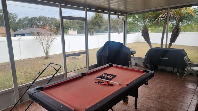 rec room featuring a water view, pool table, and tile patterned floors