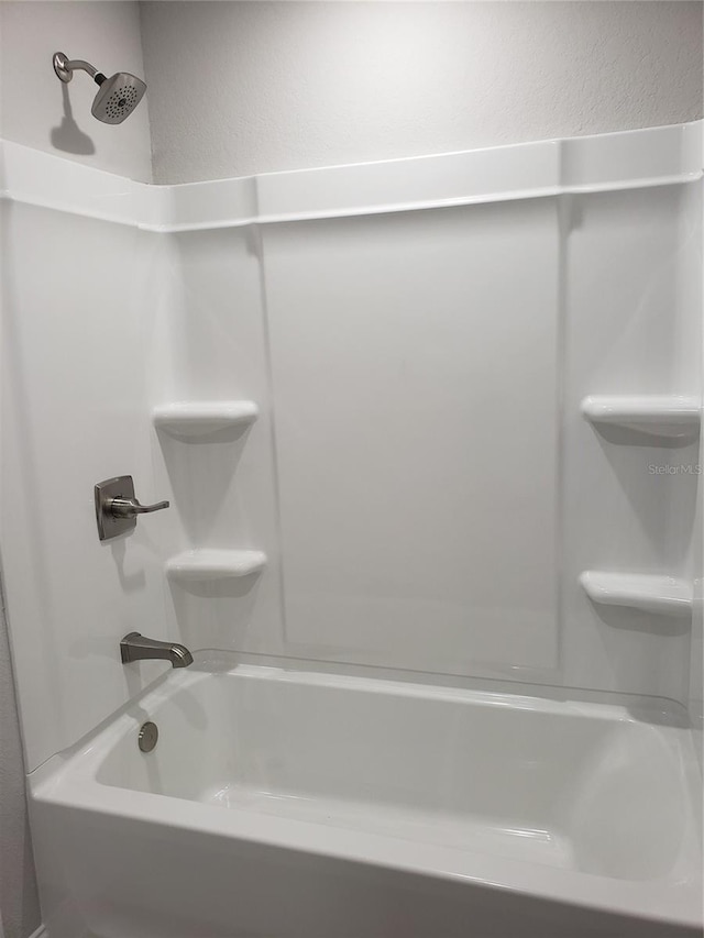 bathroom with shower / bath combination