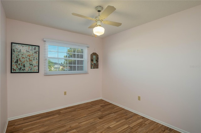 unfurnished room featuring ceiling fan and hardwood / wood-style flooring