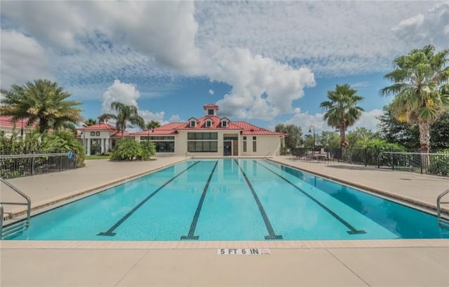 view of swimming pool featuring a patio