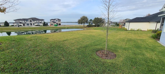 view of yard with a water view