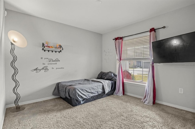 bedroom featuring carpet