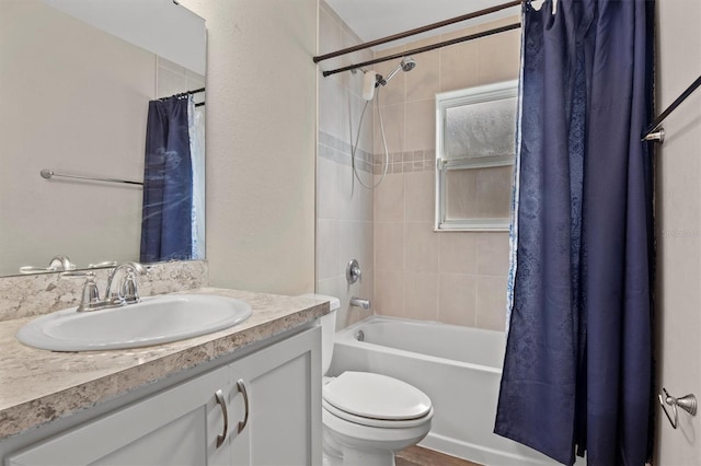 full bathroom with toilet, shower / bath combination with curtain, and vanity