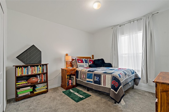 bedroom with light carpet