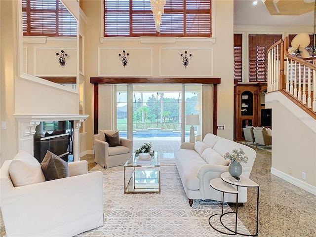 living room with a towering ceiling