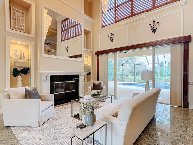 living room with a towering ceiling