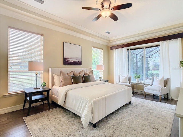 bedroom with ceiling fan, crown molding, and wood-type flooring