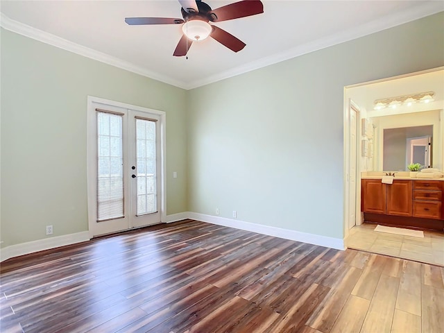 unfurnished room featuring light wood-type flooring, french doors, crown molding, and ceiling fan