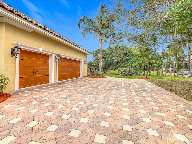 view of patio / terrace with a garage